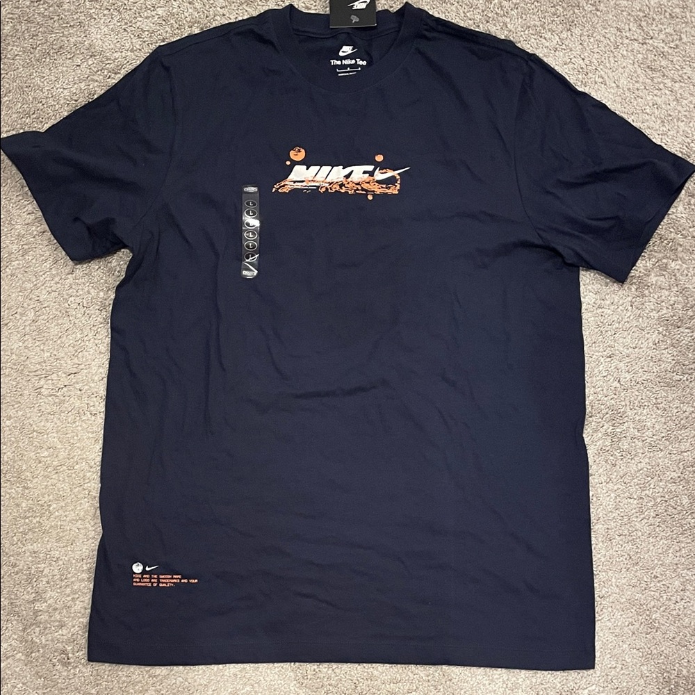 Nike Men's Navy T-Shirt with Orange Logo